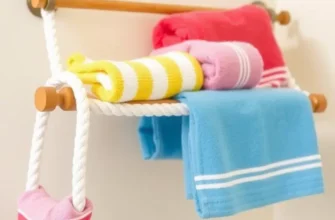 Diverse collection of DIY towel holders in a bright bathroom setting.