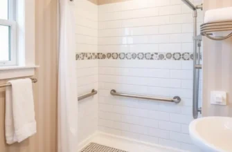 A peaceful shower area designed for safety with essential safety features and warm lighting.