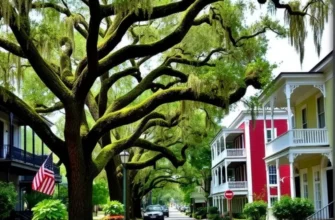 Sunset view of Savannah's riverfront with historic buildings.