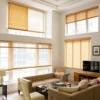 A family gathered in a bright apartment with safe window blinds that enhance safety and style.