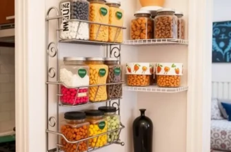 A cheerful living room featuring a stylish snack station with various organized snacks in clear jars.