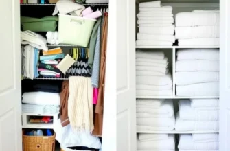 A person organizing a linen closet filled with neatly stored linens and towels.